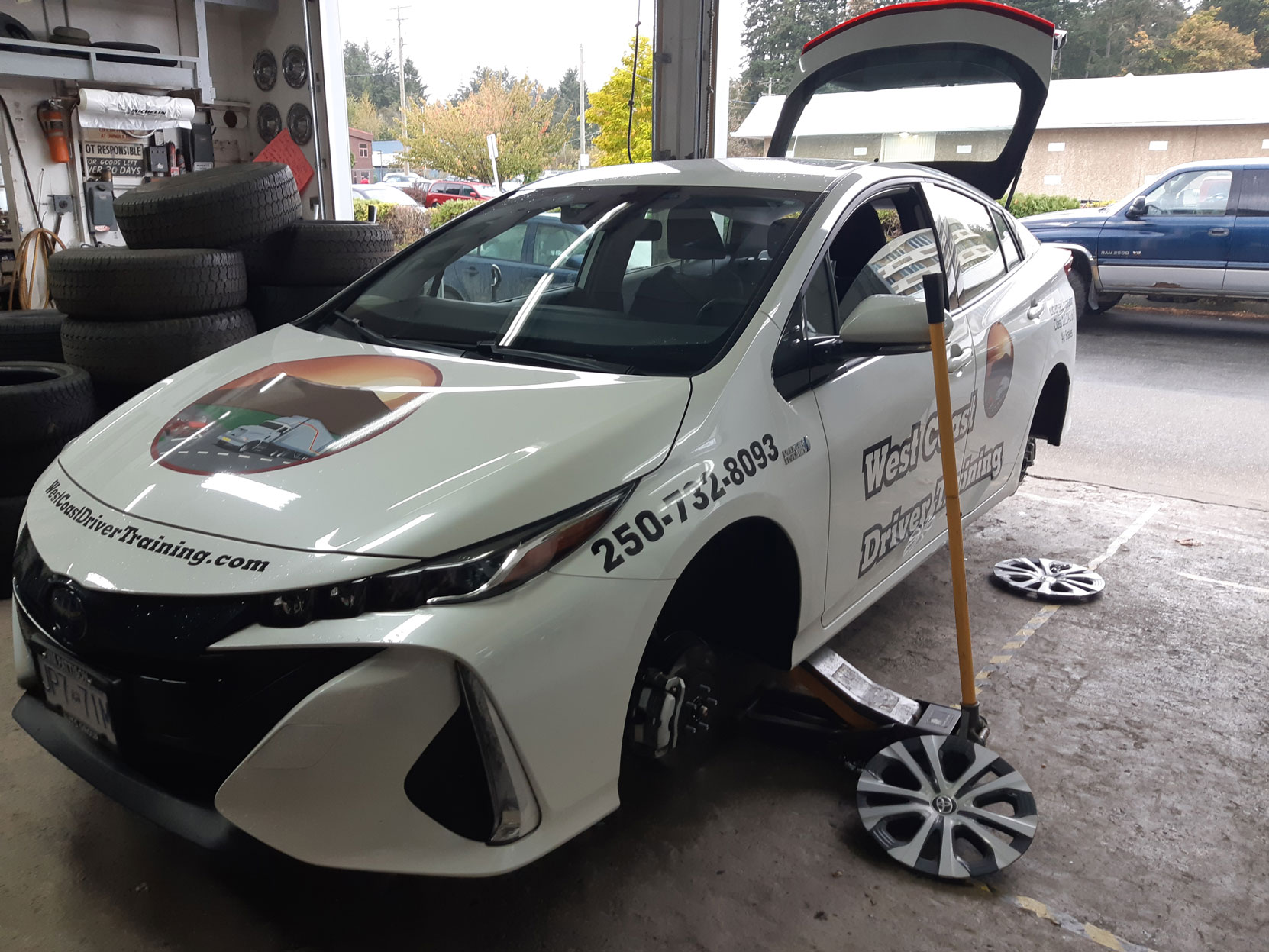 Our 2020 Prius Prime having a new set of Michelin winter tires put on at Joe's Tire Hospital in Duncan, October 2020 (photo: West Coast Driver Training)