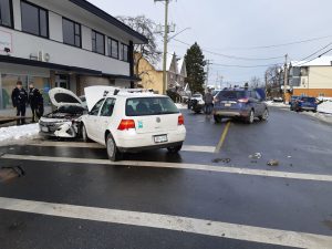 The aftermath of our 2020 Prius Prime being hit by the white VW (right). The blue SUV on the yellow center line was the first vehicle the white VW hit in this collision. (photo: West Coast Driver Training)