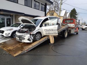 Our 2020 Prius Prime being towed after being hit by the white VW on 29 December 2021. (photo: West Coast Driver Training)