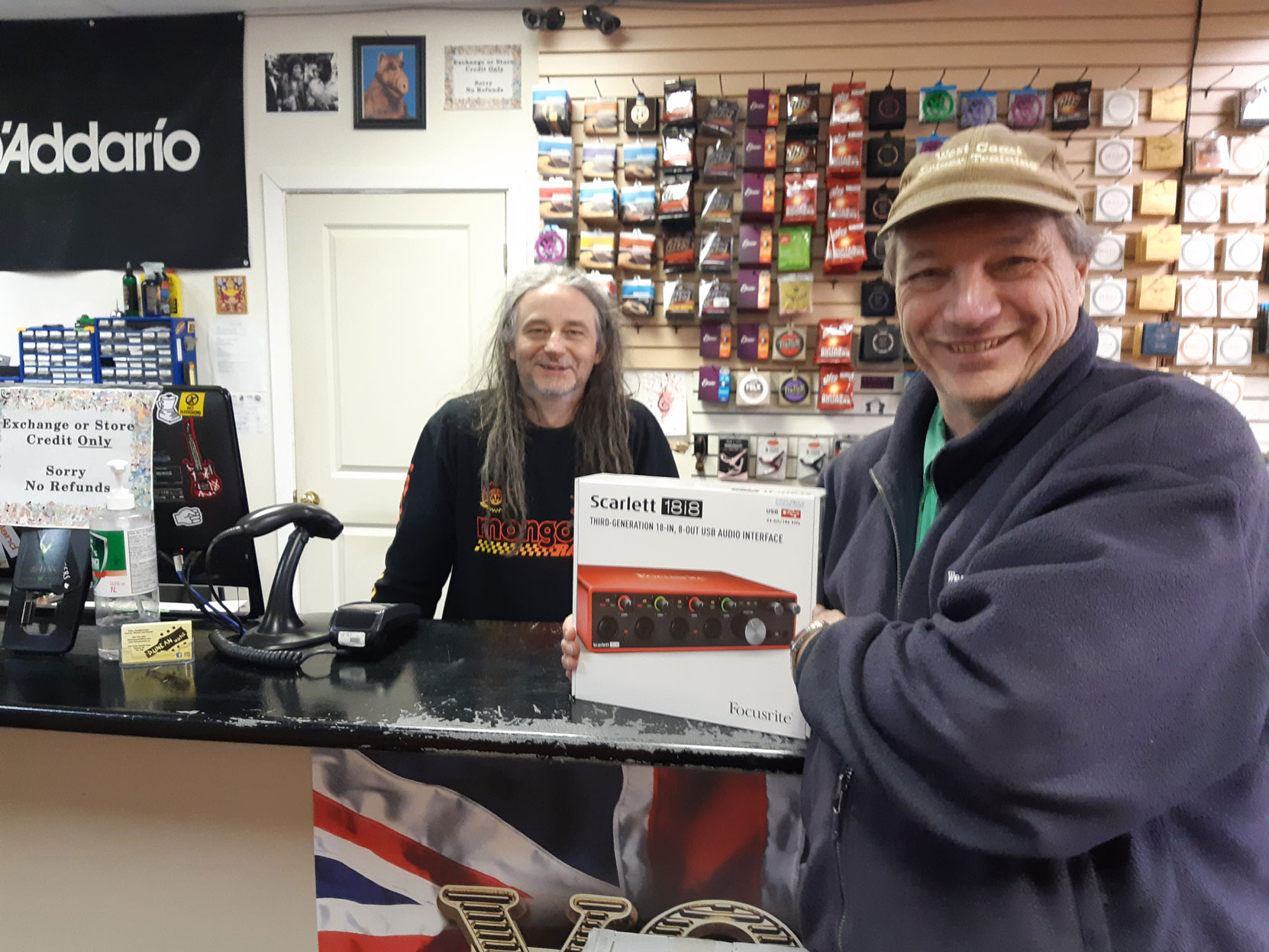 West Coast Driver Training owner and Chief Instructor, Mark Anderson, with Adam Hendershot at Duncan Music picking up the new Scarlett 18i8 audio interface that Adam special order for us, February 2023 [photo: Ryan King, Duncan Music]