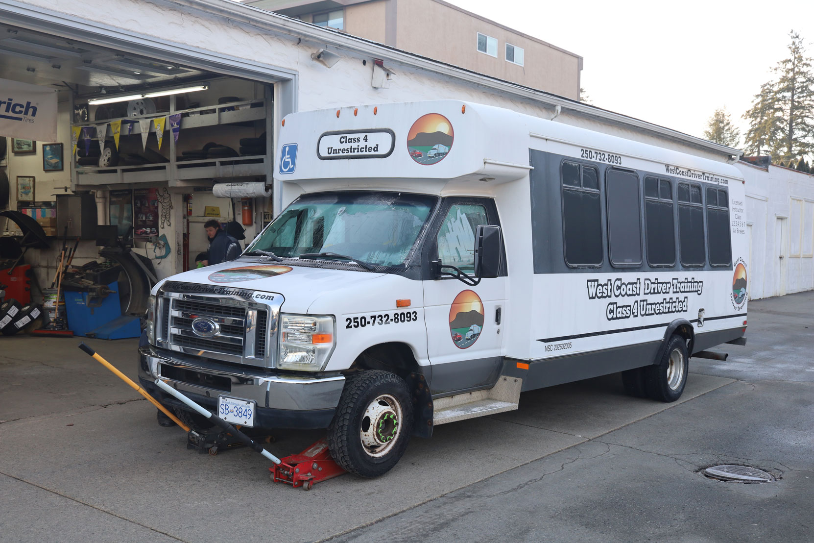 Preparation for installing new B.F. Goodrich tires on the steering axle of our Ford E450 bus at Joe's Tire Hospital, February 2023 [photo: West Coast Driver Training]