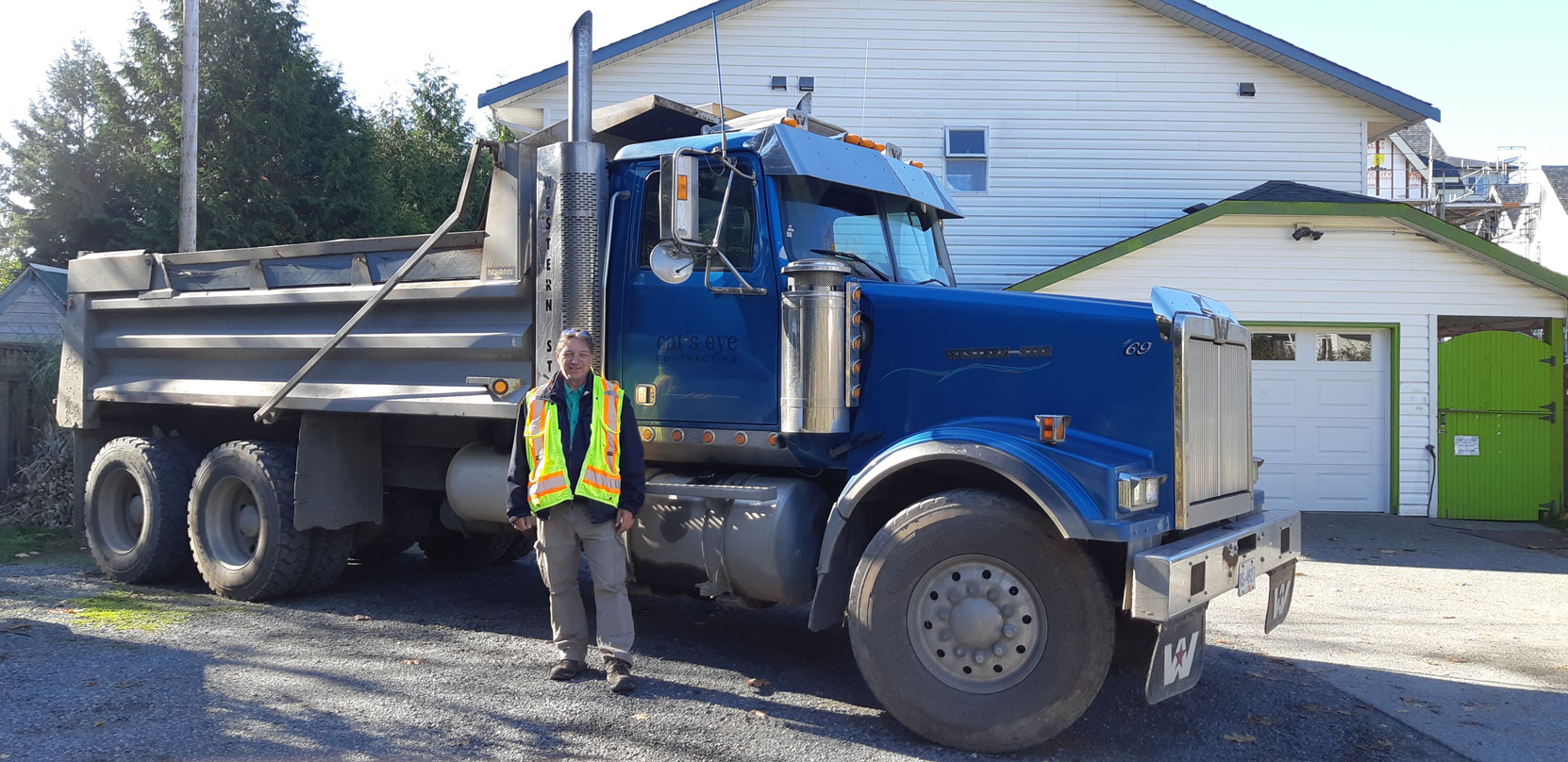 West Coast Driver Training Chief Instructor Mark Anderson teaching on a truck owned by a client, Cat's Eye Contracting, in Langford, October 2023 [photo: West Coast Driver Training]